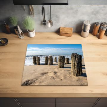 Inductie beschermer - Verweerde Palen op het Strand