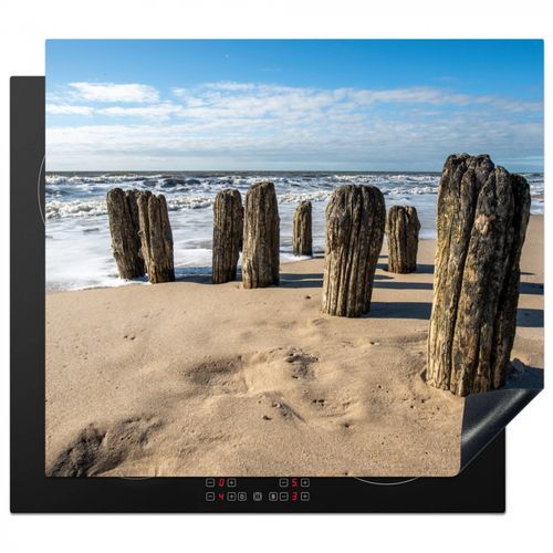 Inductie beschermer - Verweerde Palen op het Strand