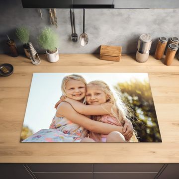 Inductie beschermer met foto